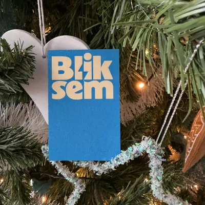 Bliksem business card in de kerstboom